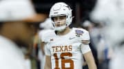 Longhorns quarterback Arch Manning warms up before the 2024 Sugar Bowl college football playoff semifinal game against the Washington Huskies at Caesars Superdome.