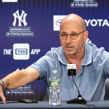 Aug 23, 2023; Bronx, New York, USA; New York Yankees general manager Brian Cashman talks with the media before the game between the Yankees and the Washington Nationals at Yankee Stadium. 