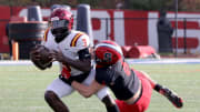 Quarterback Rich Belin from Cardinal Hayes is pulled down by Archbishop Stepinac's Eddie Palumbo during their NYCHSFL AAA semifinal football game at Archbishop Stepinac in White Plains, Nov. 11, 2023. Hayes beat Stepinac 29-26.