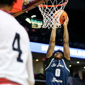 St. John Bosco's (Calif.) Brandon McCoy Jr. dunks the ball as the Braves take on the Central Bulldogs during the 39th Annual Bass Pro Shops Tournament of Champions at Great Southern Bank Arena on Thursday, Jan. 11, 2024.