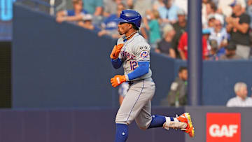 Sep 11, 2024; Toronto, Ontario, CAN; New York Mets shortstop Francisco Lindor (12) runs the bases after hitting a home run against the Toronto Blue Jays during the ninth inning at Rogers Centre. Mandatory Credit: Nick Turchiaro-Imagn Images