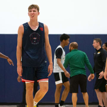 Heritage Hills' Trent Sisley (40) walks to the bench for a timeout during the Notre Dame Team Camp at Rolfs Athletics Hall on Thursday, June 13, 2024, in South Bend.