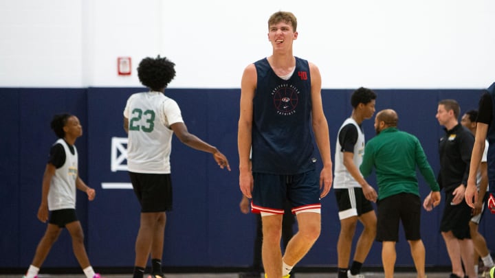 Heritage Hills' Trent Sisley (40) walks to the bench for a timeout during the Notre Dame Team Camp at Rolfs Athletics Hall on Thursday, June 13, 2024, in South Bend.