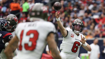 Nov 5, 2023; Houston, Texas, USA; Tampa Bay Buccaneers quarterback Baker Mayfield (6) passes to wide receiver Mike Evans (13) against the Houston Texans in the first quarter at NRG Stadium. Mandatory Credit: Thomas Shea-USA TODAY Sports