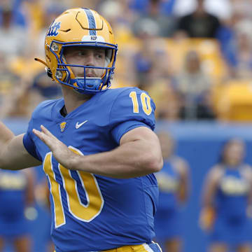 Aug 31, 2024; Pittsburgh, Pennsylvania, USA;  Pittsburgh Panthers quarterback Eli Holstein (10) passes the ball against the Kent State Golden Flashes during the first quarter at Acrisure Stadium. Mandatory Credit: Charles LeClaire-Imagn Images