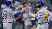 Jul 24, 2024; Bronx, New York, USA; New York Mets first baseman Pete Alonso (20) celebrates his two run home run against the New York Yankees with designated hitter J.D. Martinez (28) during the fourth inning at Yankee Stadium. Mandatory Credit: Brad Penner-Imagn Images