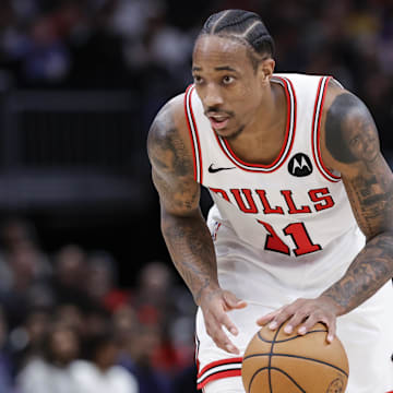 Dec 20, 2023; Chicago, Illinois, USA; Chicago Bulls forward DeMar DeRozan (11) brings the ball up court against the Los Angeles Lakers during the first half at United Center. Mandatory Credit: Kamil Krzaczynski-Imagn Images