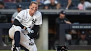 Jun 6, 2024; Bronx, New York, USA; New York Yankees first baseman Anthony Rizzo (48) reacts after being hit by a foul ball during the third inning against the Minnesota Twins at Yankee Stadium. Mandatory Credit: Vincent Carchietta-Imagn Images