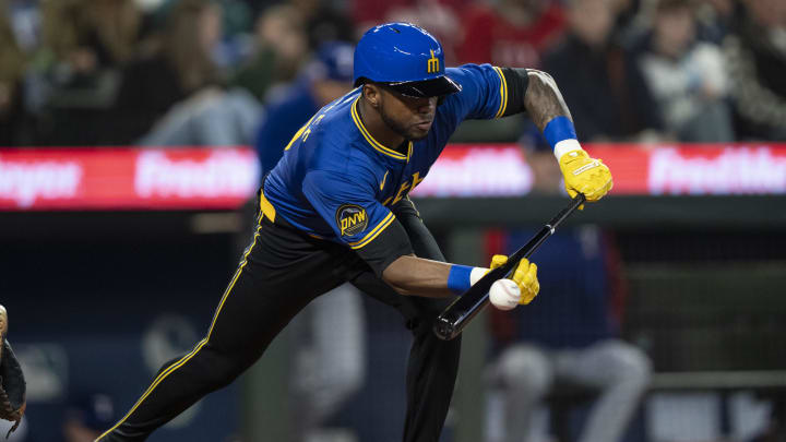 Seattle Mariners outfielder Victor Robles (10) hits a bunt single against the Texas Rangers in June at T-Mobile Park.