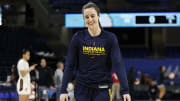 Indiana Fever guard Caitlin Clark (22) warms up before a game