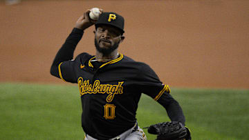 Aug 21, 2024; Arlington, Texas, USA; Pittsburgh Pirates starting pitcher Domingo German (0) pitches against the Texas Rangers during the first inning at Globe Life Field. Mandatory Credit: Jerome Miron-Imagn Images