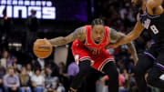 Mar 14, 2022; Sacramento, California, USA; Chicago Bulls forward DeMar DeRozan (11) controls the ball against Sacramento Kings forward Maurice Harkless (8) during the third quarter at Golden 1 Center. Mandatory Credit: Sergio Estrada-USA TODAY Sports