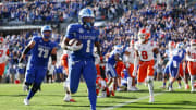 Dec 29, 2023; Jacksonville, FL;  Kentucky Wildcats running back Ray Davis (1) runs into the end zone for a touchdownagainst the Clemson tigers in the fourth quarter during the Gator Bowl at EverBank Stadium. 