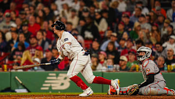 Sep 9, 2024; Boston, Massachusetts, USA; Boston Red Sox designated hitter Tyler O'Neill (17) hits a home run against the Baltimore Orioles in the eighth inning at Fenway Park. Mandatory Credit: David Butler II-Imagn Images