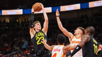 Feb 27, 2024; Atlanta, Georgia, USA; Utah Jazz forward Lauri Markkanen (23) grabs a rebound against the Atlanta Hawks in the second half at State Farm Arena. Mandatory Credit: Brett Davis-USA TODAY Sports