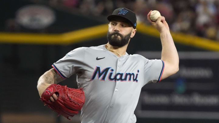 May 26, 2024; Phoenix, Arizona, USA; Miami Marlins pitcher Tanner Scott (66) throws against the Arizona Diamondbacks in the ninth inning at Chase Field. Mandatory Credit: Rick Scuteri-USA TODAY Sports