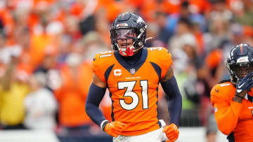 Sep 10, 2023; Denver, Colorado, USA; Denver Broncos safety Justin Simmons (31) reacts to a turnover in the third quarter against the Las Vegas Raiders at Empower Field at Mile High