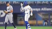 Apr 17, 2024; Toronto, Ontario, CAN; Toronto Blue Jays shortstop Bo Bichette (11) celebrates hitting a double against the New York Yankees during the sixth inning at Rogers Centre. Mandatory Credit: Nick Turchiaro-Imagn Images