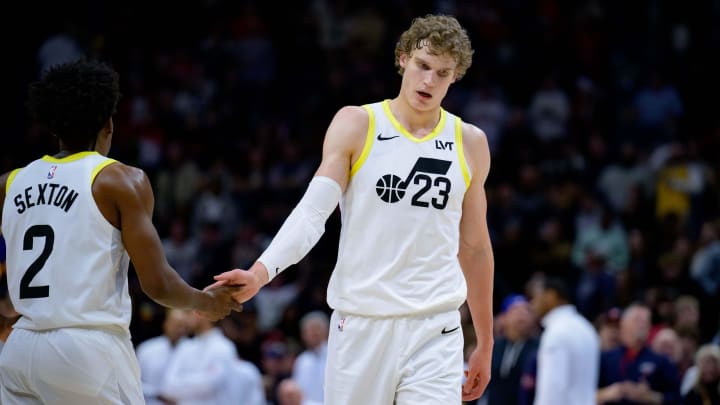 Dec 28, 2023; New Orleans, Louisiana, USA; Utah Jazz forward Lauri Markkanen (23) celebrates with Utah Jazz guard Collin Sexton (2) against the New Orleans Pelicans at the Smoothie King Center. Mandatory Credit: Matthew Hinton-USA TODAY Sports