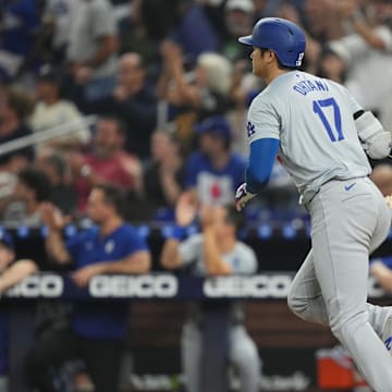 Los Angeles Dodgers designated hitter Shohei Ohtani (17) flips his bat after hitting a two-run home run in the third inning against the Miami Marlins at loanDepot Park on Sept 17.