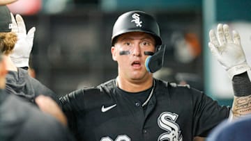 Jul 23, 2024; Arlington, Texas, USA; Chicago White Sox catcher Korey Lee (26) slaps hands in the dugout after scoring a run in the third inning against the Texas Rangers at Globe Life Field.