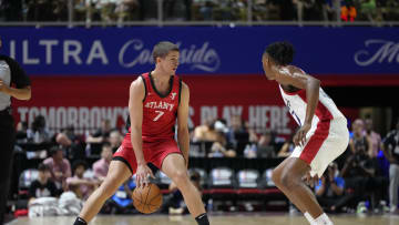 Jul 12, 2024; Las Vegas, NV, USA;  Atlanta Hawks forward/guard Nikola Durisic (7) controls the ball against Washington Wizards guard Bub Carrington (17) during the first half at Thomas & Mack Center. Mandatory Credit: Lucas Peltier-USA TODAY Sports