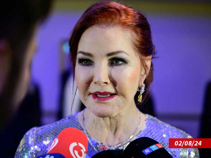 Priscilla Presley speaks to the media during a photo call