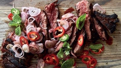 Hanger Steak with Charred Limes, Fresh Chiles and Herbs