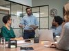 Man giving presentation in boardroom