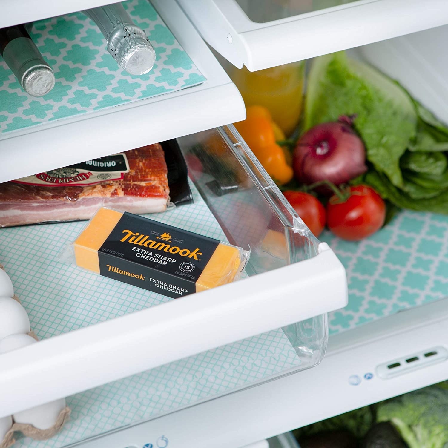 the shelf liners in green in a fridge, on inner shelves, doors shelves, and in drawers