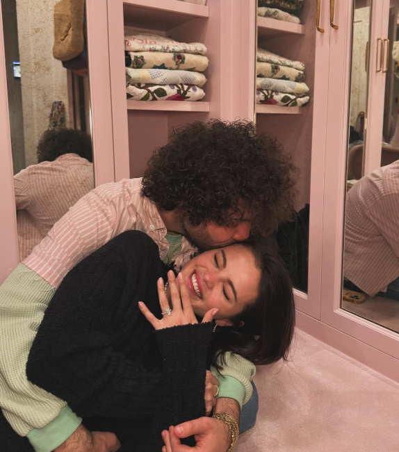 Benny Blanco and Selena Gomez embracing