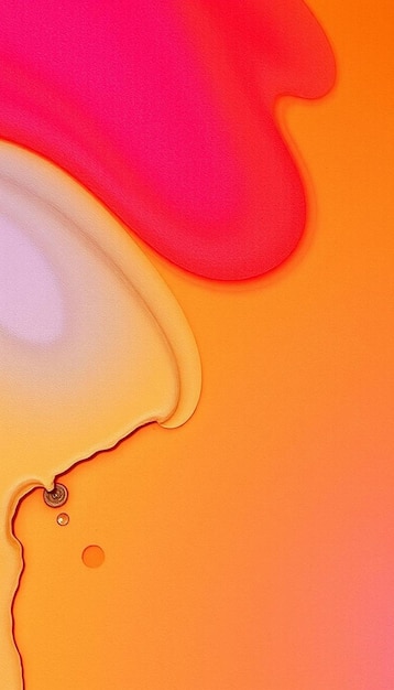 Photo une image rose et orange d'une goutte de liquide