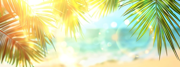 Foto foglia di palma verde sulla spiaggia di sabbia tropicale con il mare blu sfocato con la luce del sole bokeh vacanze estive