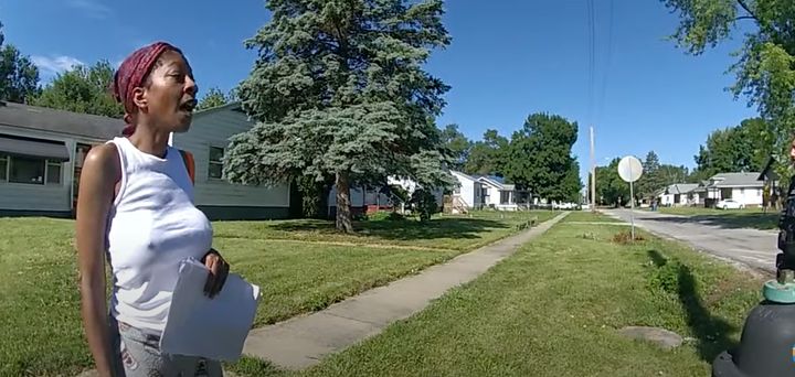 Sonya Massey, 36, speaks with Springfield Police Department officers outside of her mother's home on July 5, 2024.