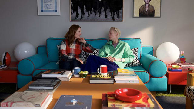 A photo still of Julianne Moore and Tilda Swinton in 'The Room Next Door'