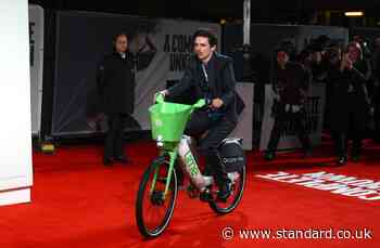 Timothee Chamalet arrives on red carpet on a Lime bike at London premiere of A Complete Unknown