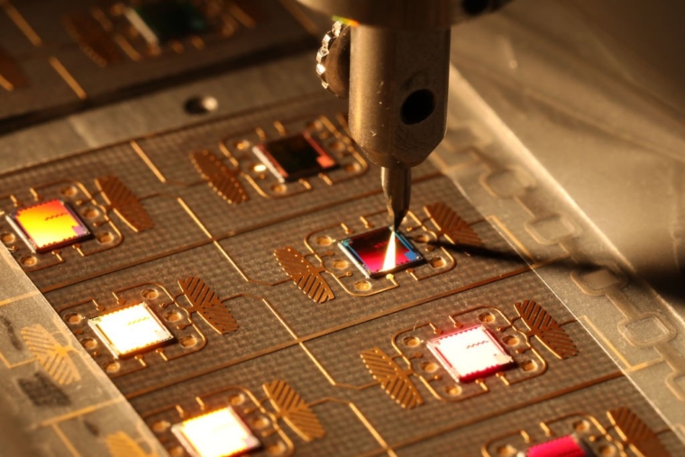 ZELENOGRAD, MOSCOW, RUSSIA SEPTEMBER 6, 2021: A device checking how firmly a microchip is mounted on a carrier tape at a workshop manufacturing microchips for electronic passports at the Mikron plant. Alexander Ryumin/TASS (Photo by Alexander Ryumin\TASS via Getty Images)