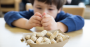 Boy-with-peanuts_IStock-michellegibson-497444988.png