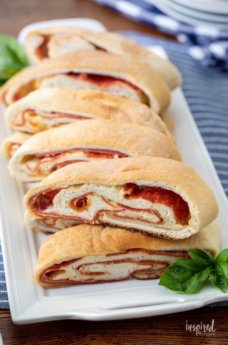 plate of sliced pepperoni stuffed pizza bread