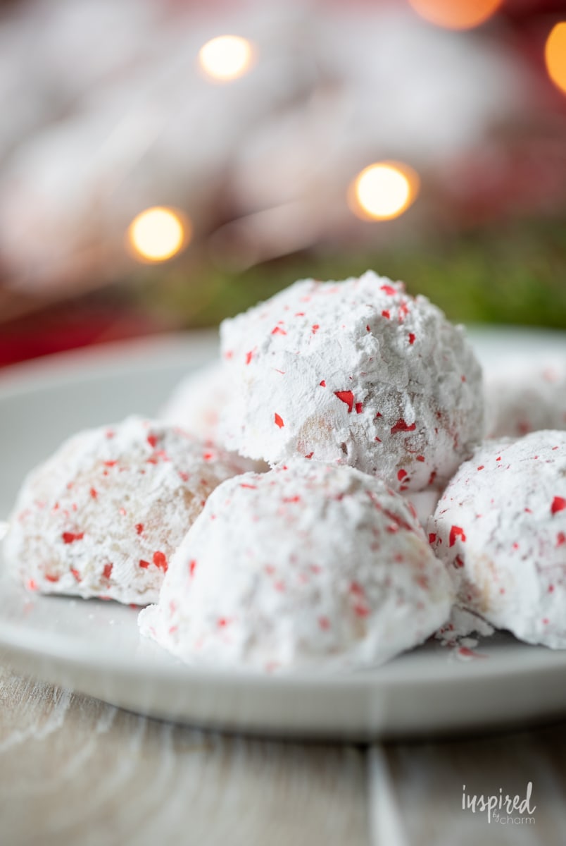 Cherry Walnut Snowball Cookies on a plate.