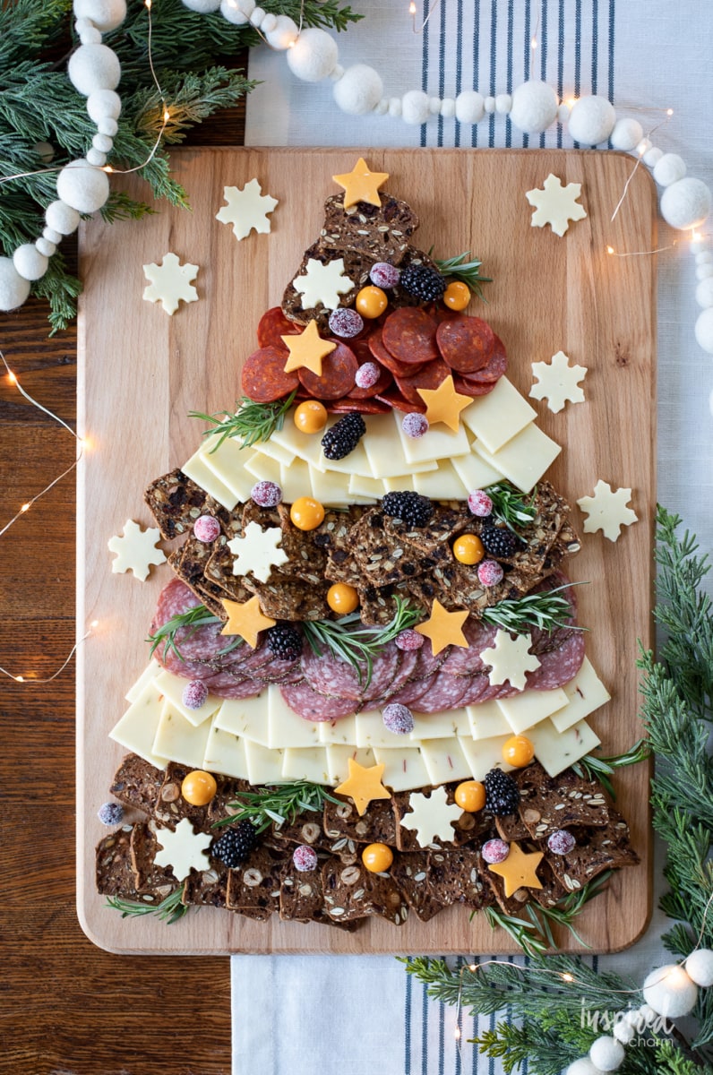 Christmas Cheese Board shared like a tree on a table.