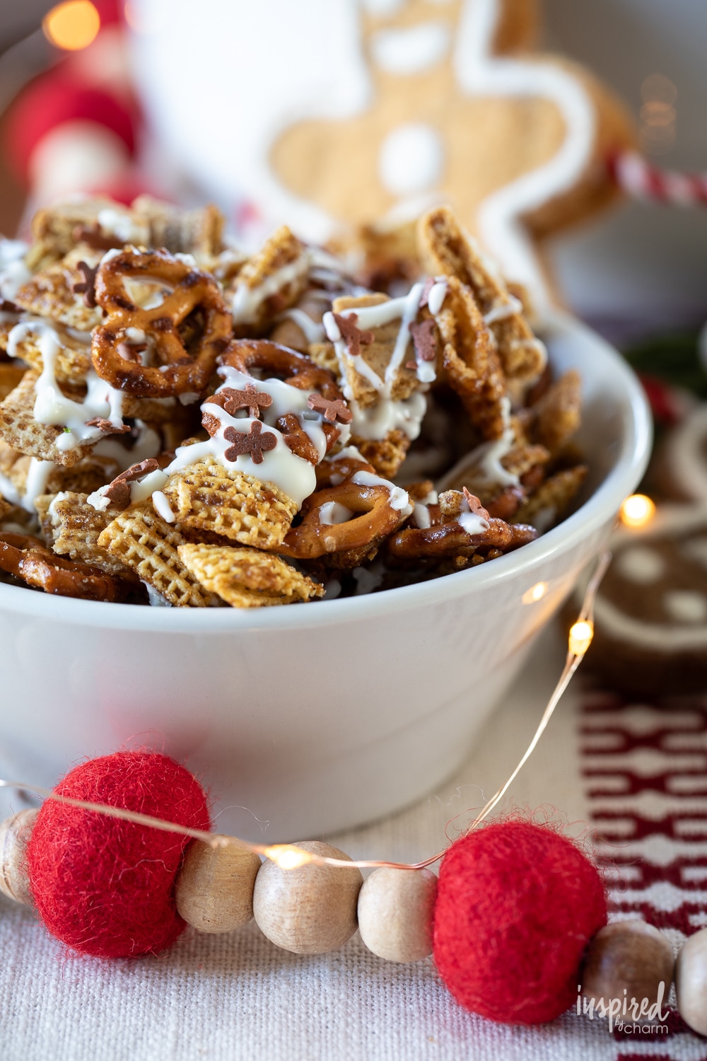 serving bowl filled with white chocolate chex mix.