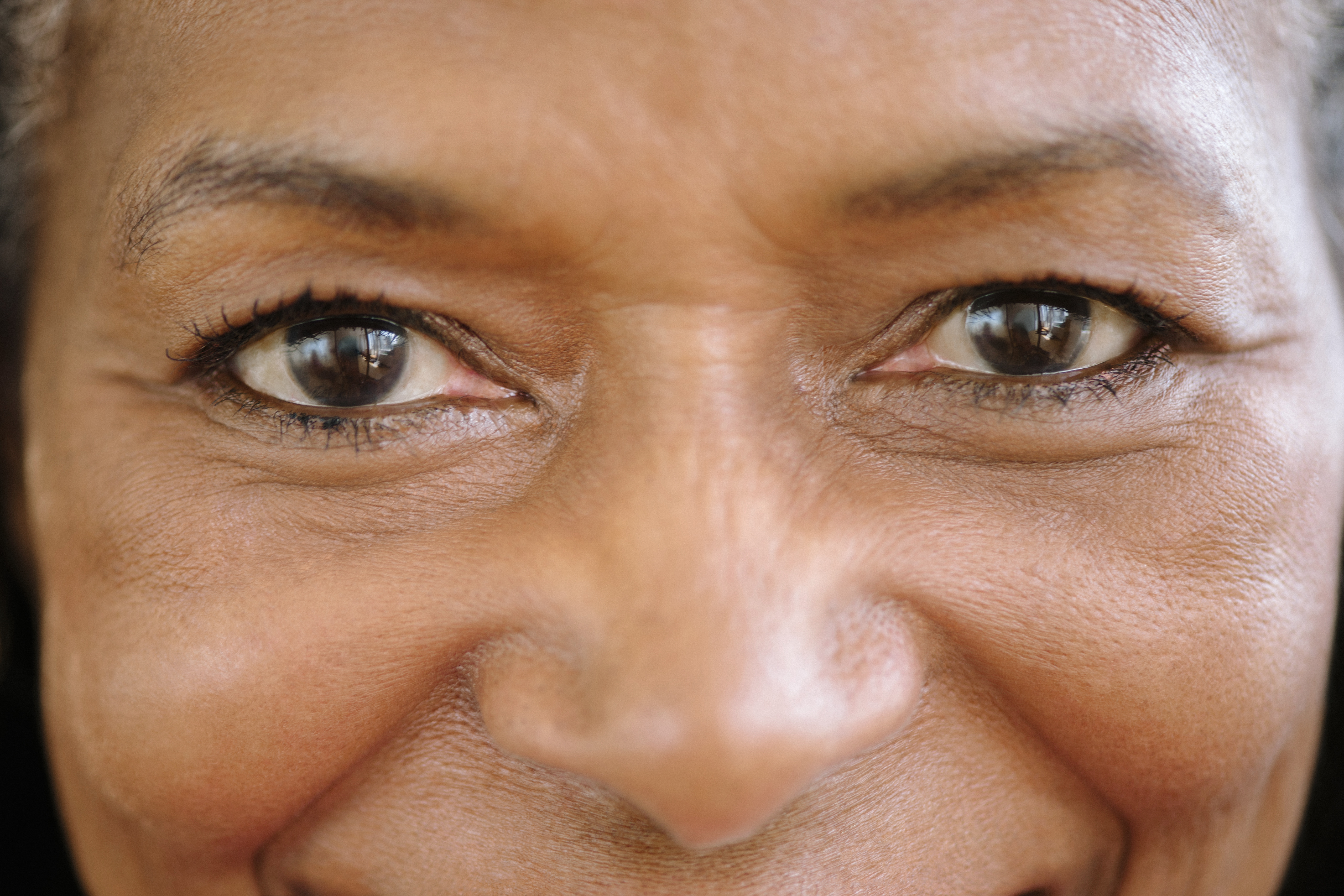 Close up of mixed race woman smiling at camera 