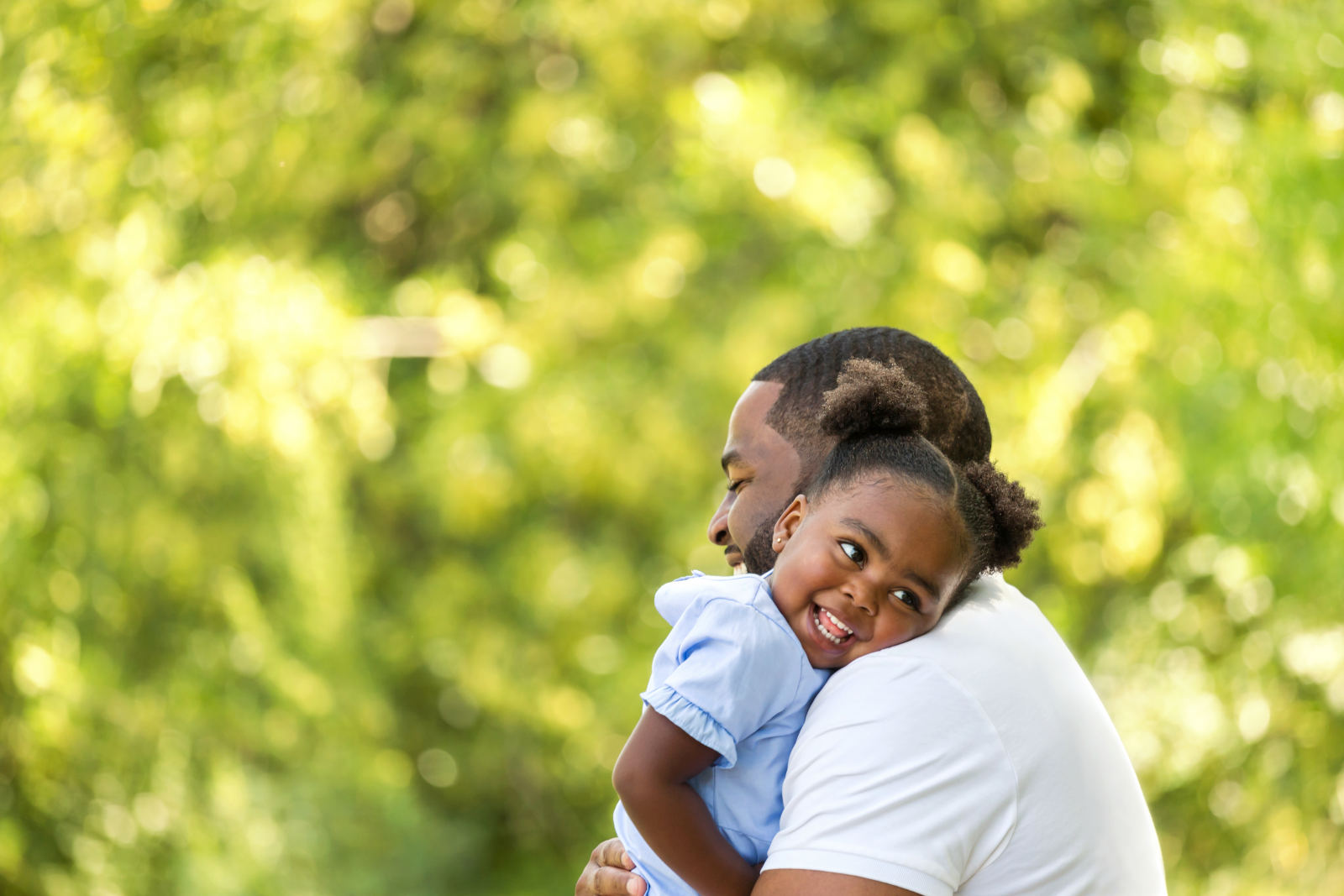 Man hugging his daughter 