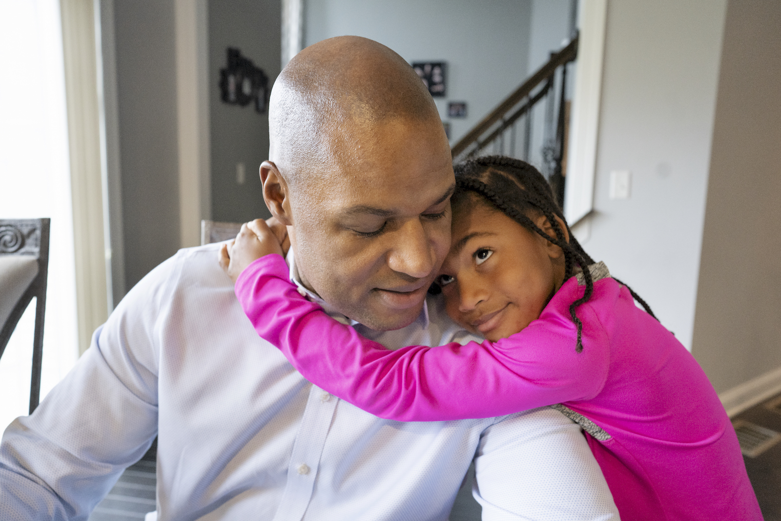 Father and daughter hugging 