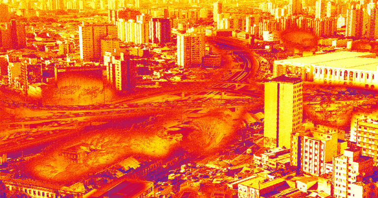 Imagem aérea do centro da cidade de São Paulo, com poucas áreas verdes e dezenas de prédios. A foto está posterizada, ressaltando os tons vermelhos e amarelos representando o calor