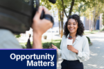 A person smiling while being interviewed on camera outdoors, holding a microphone. The text overlay reads "Opportunity Matters."