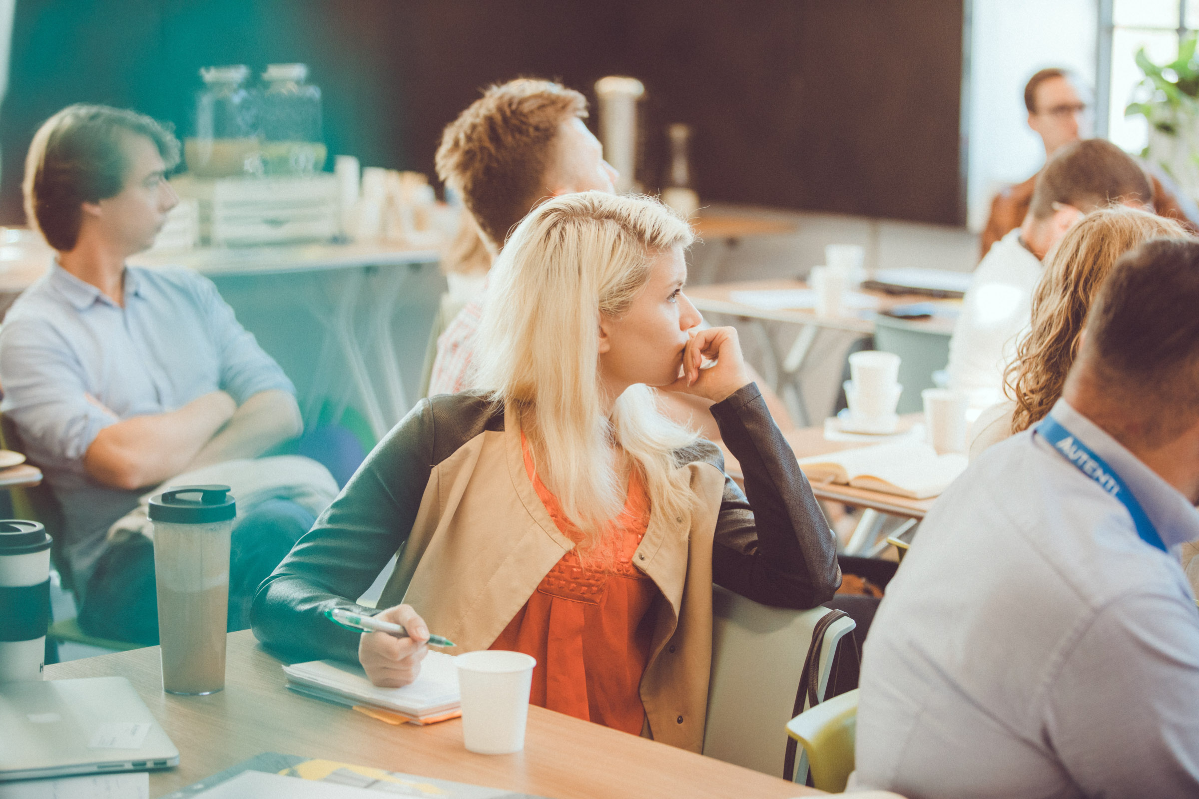 A lady is concentrating on a presentation.