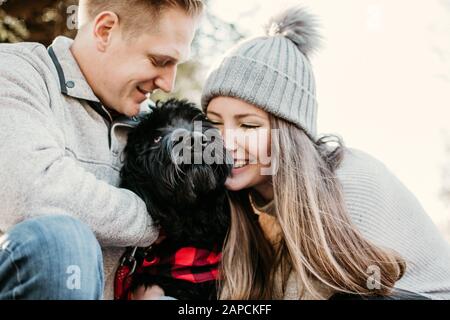 Young couple with their dog. Stock Photo