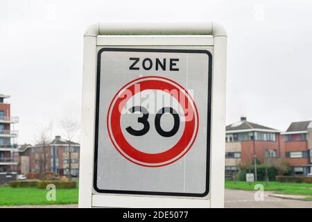 Sign with 'Zone 30' indicating the speed limit in the specific area Stock Photo